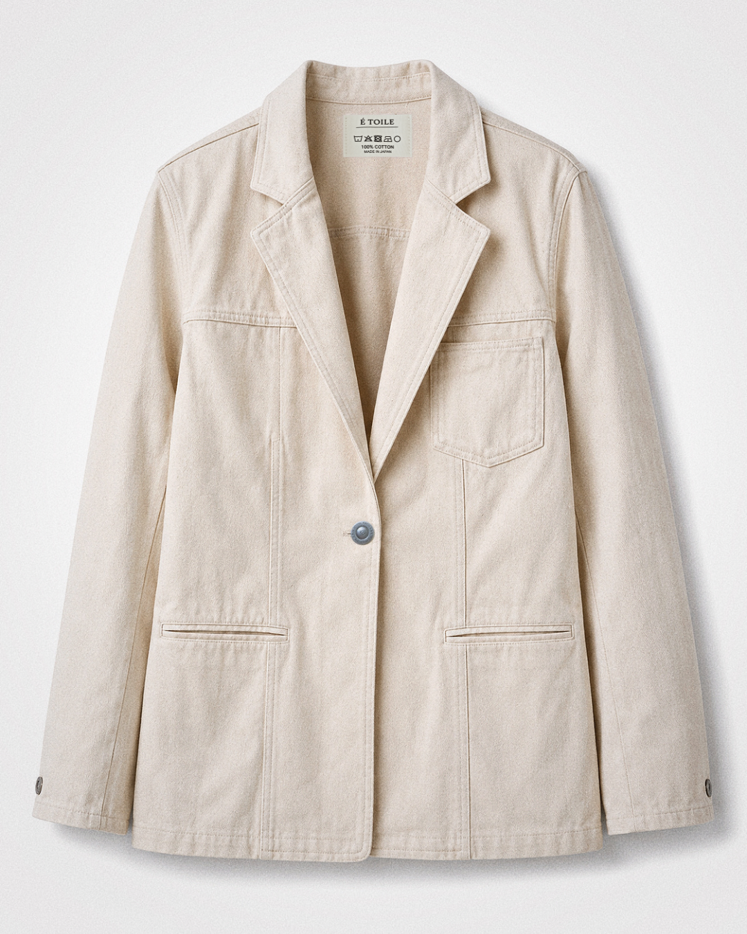 Cotton Twill Jacket — front flat lay showing brass button and pockets